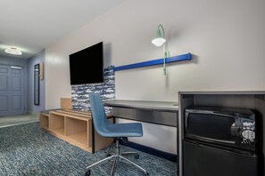 A modern office space with a desk, chair, and a microwave. - Garner Hotel Birch Run Frankenmuth Area by IHG (Birch Run)