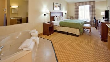 Suite, 1 King Bed, Non Smoking, Jetted Tub | Desk, iron/ironing board, free cribs/infant beds, rollaway beds