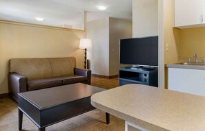 Desk, laptop workspace, blackout drapes, iron/ironing board