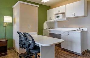 Studio, 1 King Bed, Non Smoking | Private kitchen | Fridge, microwave, stovetop, cookware/dishes/utensils