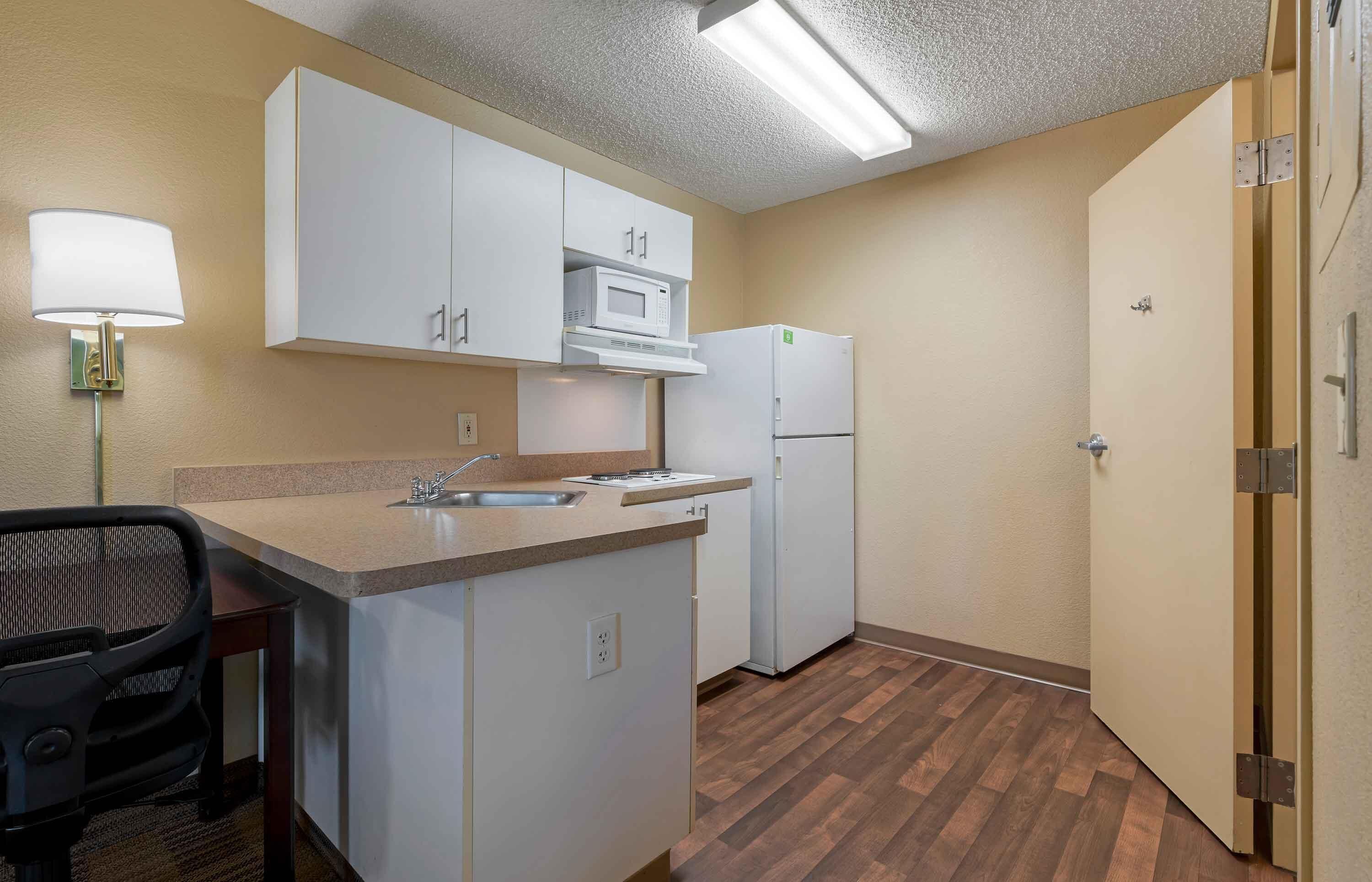Studio, 1 Queen Bed, Non Smoking | Private kitchen | Coffee/tea maker, full-size fridge, microwave, stovetop