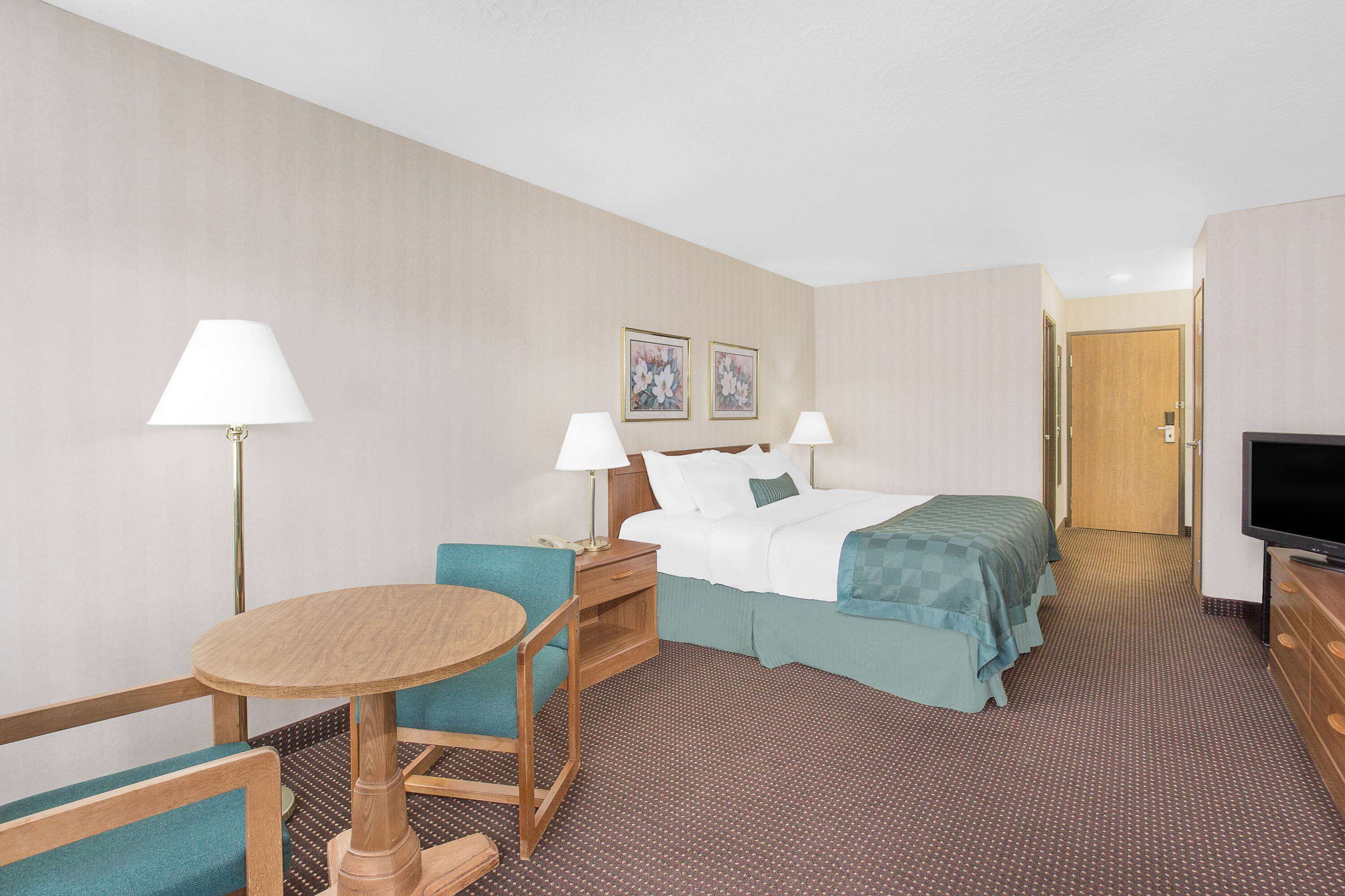 premium room, 1 king bed, accessible, lake view | in-room safe, desk, blackout curtains, iron/ironing board
