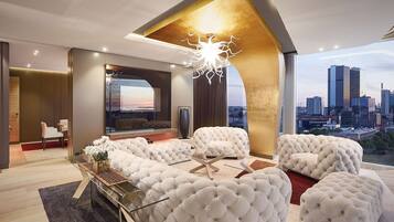 Presidential Suite | Living area | 42-inch flat-screen TV with digital channels, TV