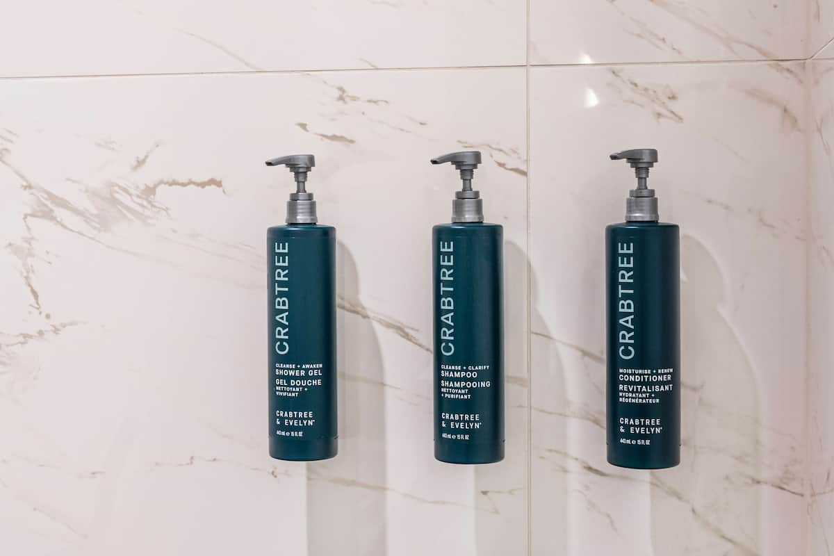 Separate bathtub and shower, rainfall showerhead, designer toiletries