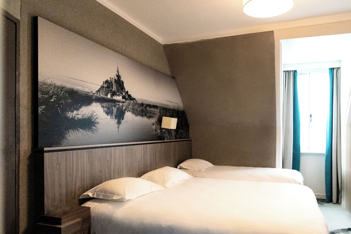 Triple Room Historic House Annette Poulard Bay View | 1 bedroom, minibar, desk, blackout curtains