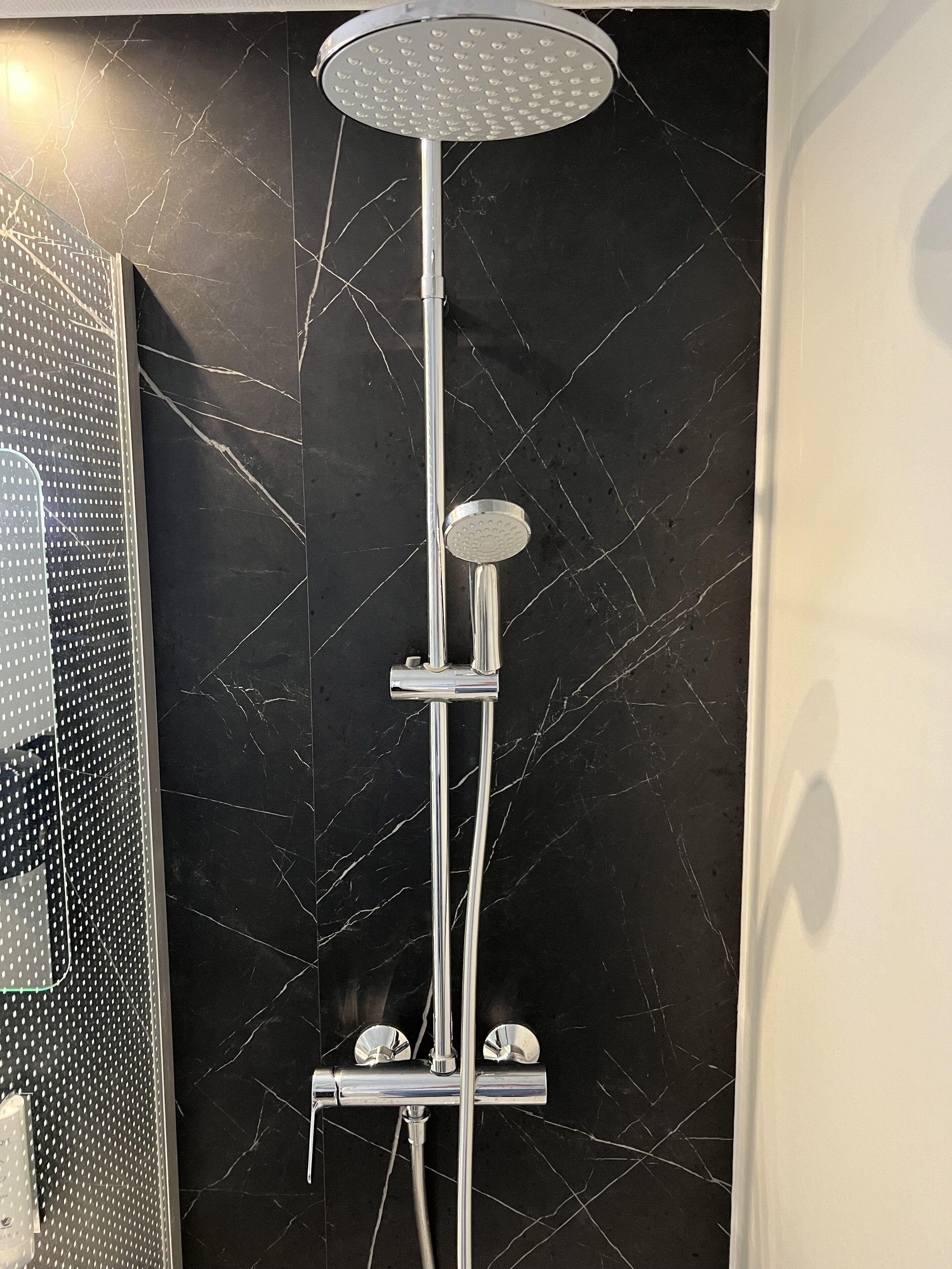 shower, free toiletries, hair dryer, towels