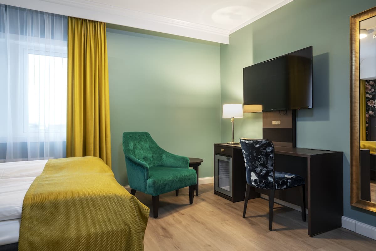 Ropa de cama de alta calidad, colchones con pillow-top y minibar