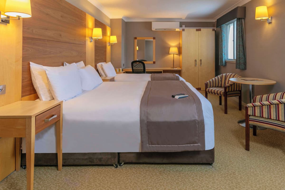 comfort room, multiple beds, non smoking | 1 bedroom, premium bedding, in-room safe, desk