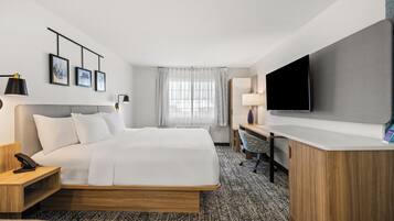 Suite, 1 kingsize bed met slaapbank, niet-roken | Hypoallergeen beddengoed, pillowtop-bedden, individueel gedecoreerd