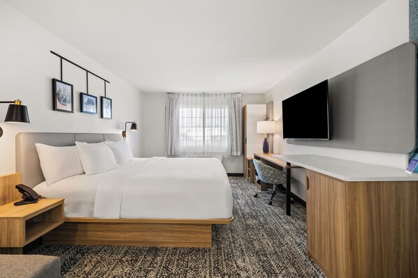 Suite, 1 kingsize bed met slaapbank, niet-roken | Hypoallergeen beddengoed, pillowtop-bedden, individueel gedecoreerd