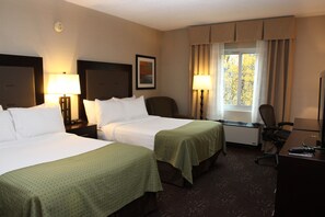 Hypo-allergenic bedding, desk, laptop workspace, blackout drapes