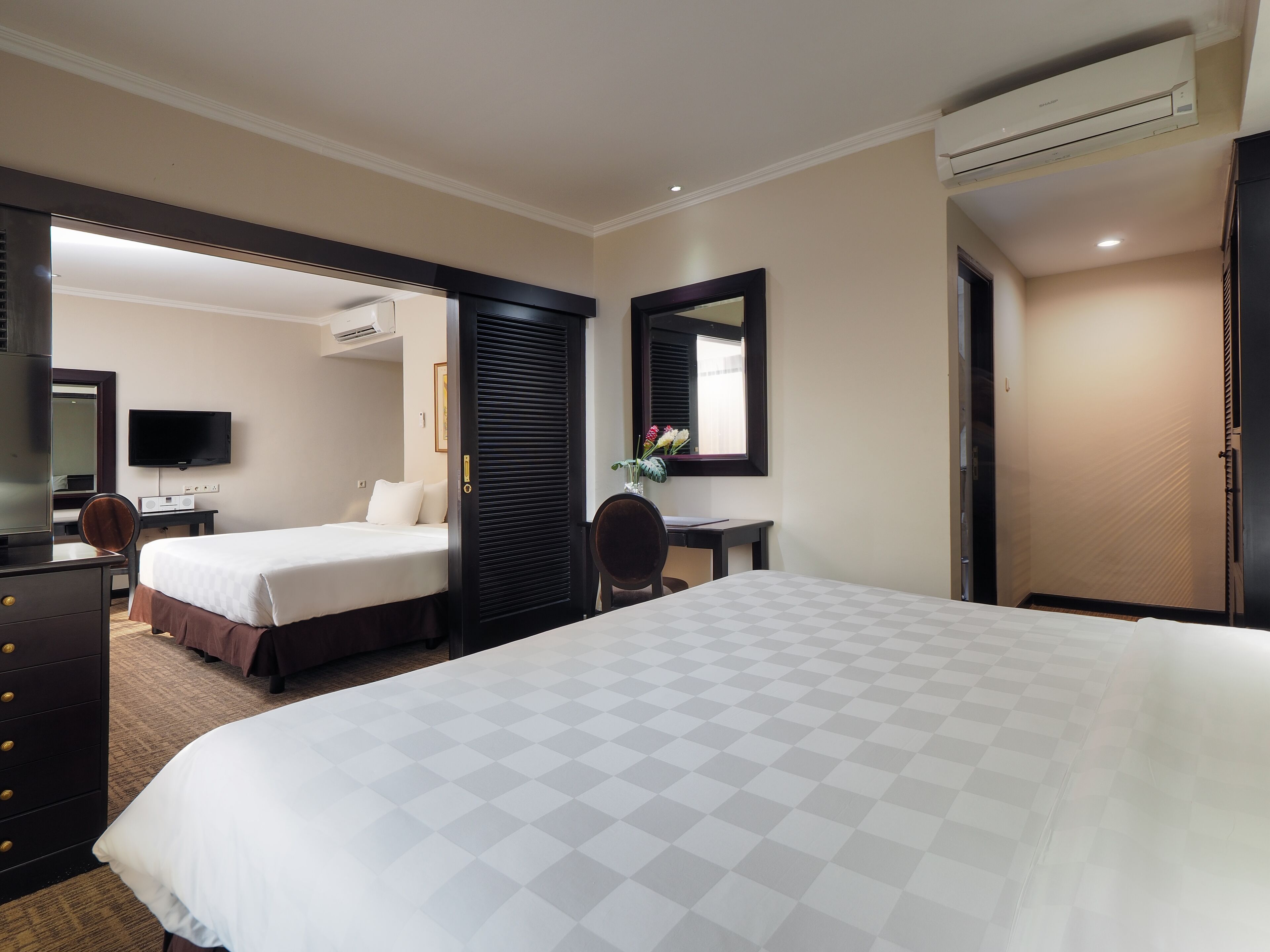 suite | in-room safe, desk, laptop workspace, blackout curtains