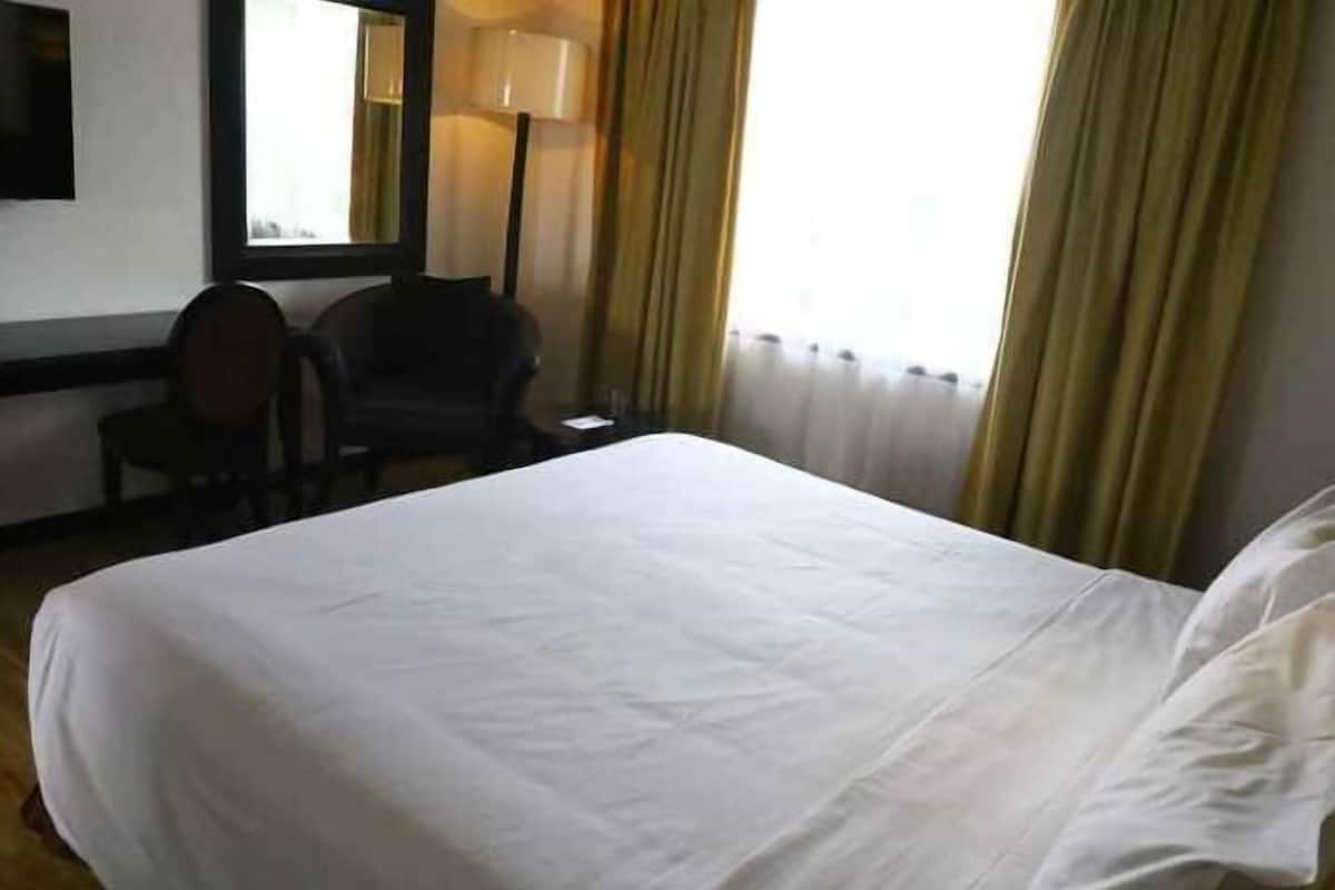 In-room safe, desk, laptop workspace, blackout curtains