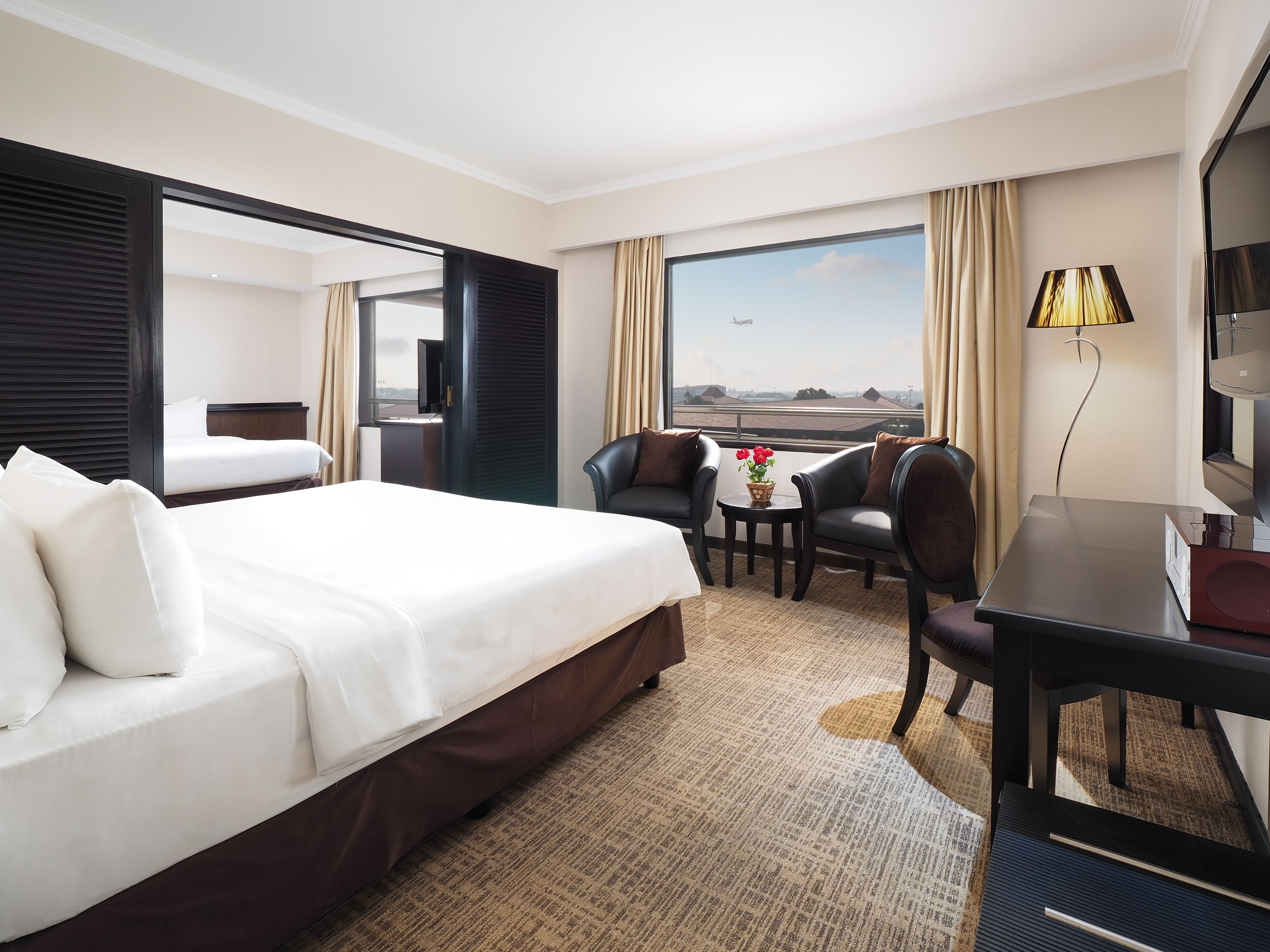 suite | in-room safe, desk, laptop workspace, blackout curtains