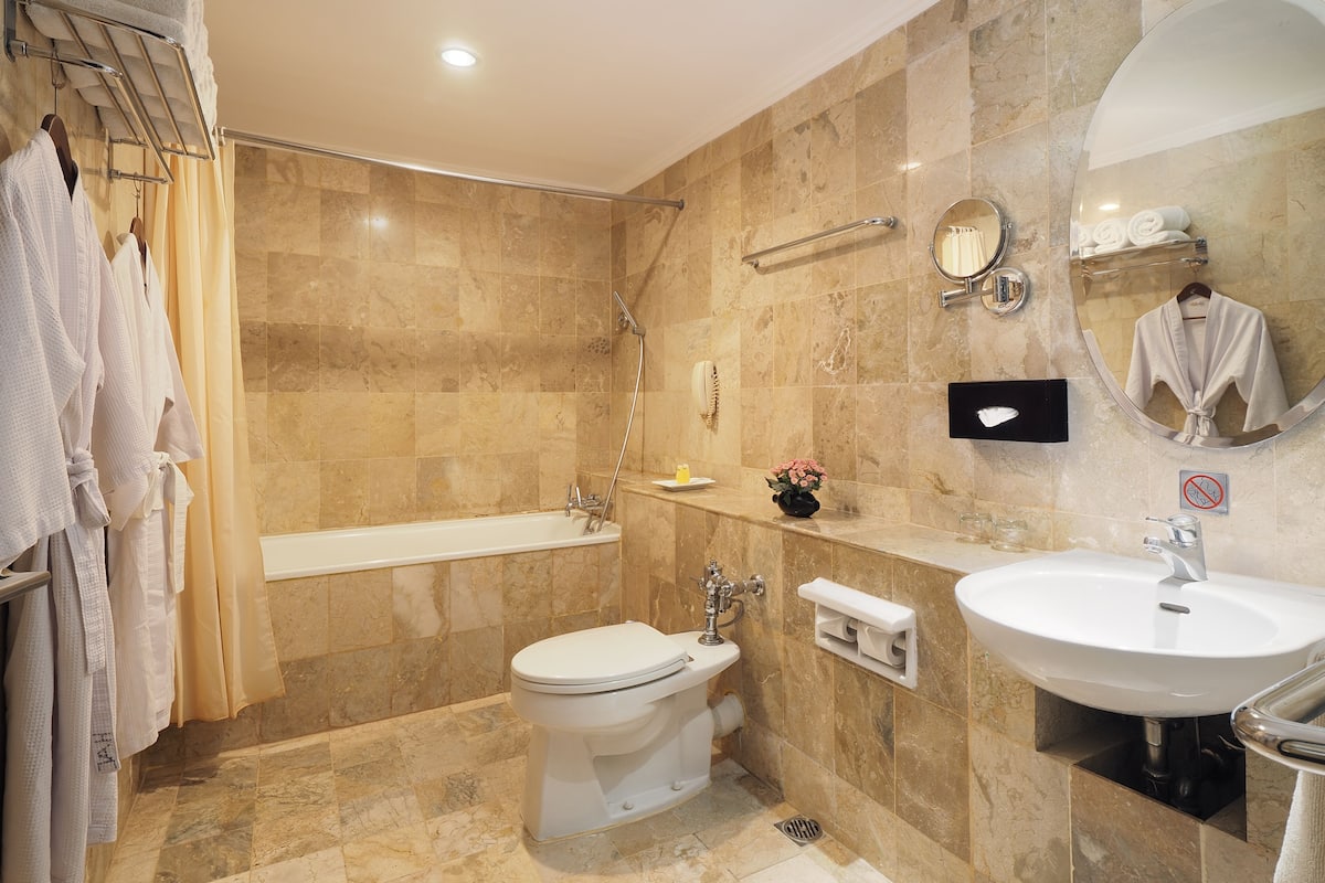 suite | bathroom | shower, rainfall showerhead, free toiletries, slippers