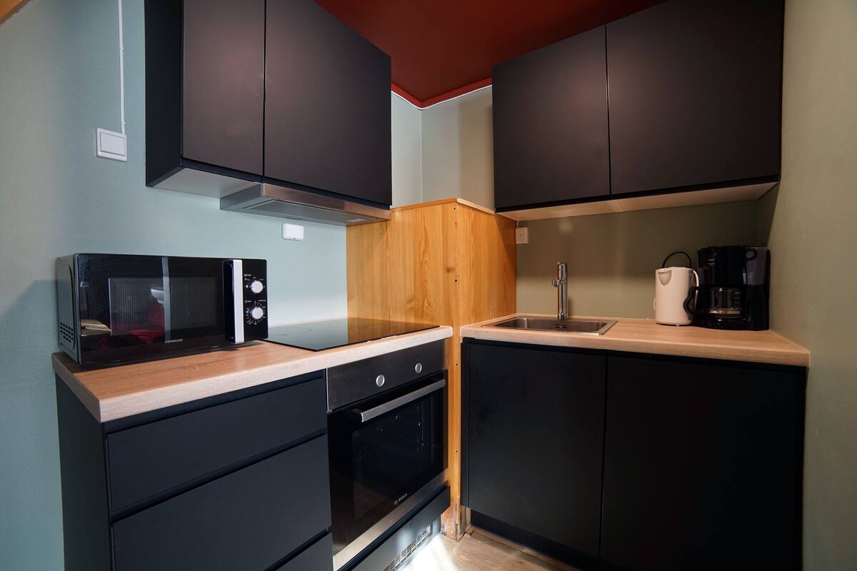 coffee/tea maker, electric kettle, high chair, dining tables