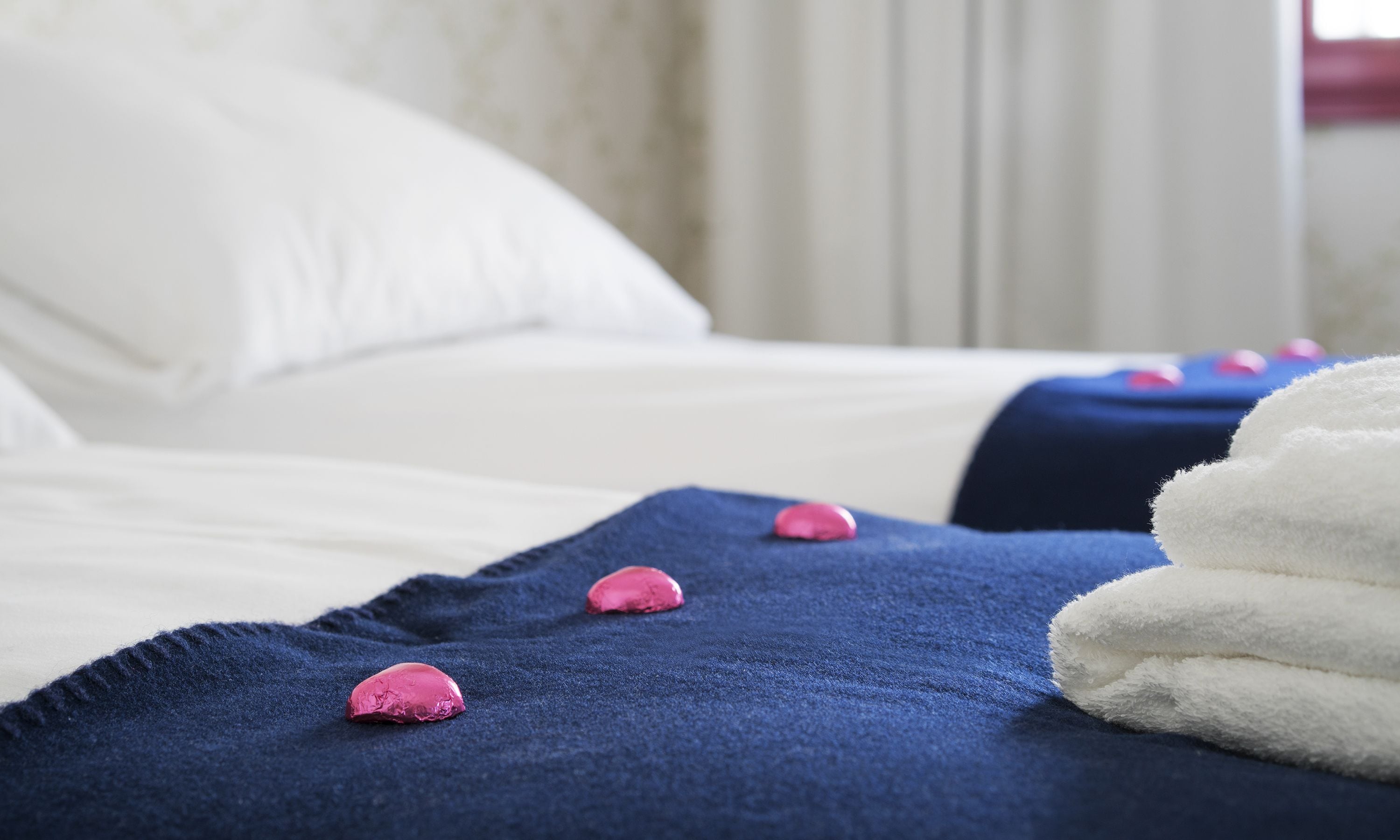 Premium bedding, pillow-top beds, soundproofing, free WiFi