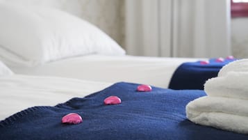 Premium bedding, pillow-top beds, soundproofing, free WiFi