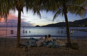 On the beach, white sand, free beach cabanas, sun-loungers