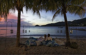 On the beach, white sand, free beach cabanas, sun-loungers