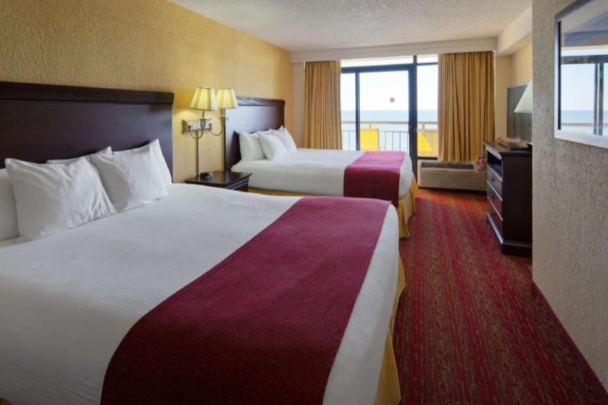 Hypo-allergenic bedding available, in-room safe, desk, laptop workspace