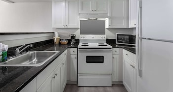 Suite, 2 Queen Beds, Kitchen, Oceanfront (with Sofabed) | Private kitchen | Fridge, microwave, coffee/tea maker at Best Western Ocean Sands Beach Resort
