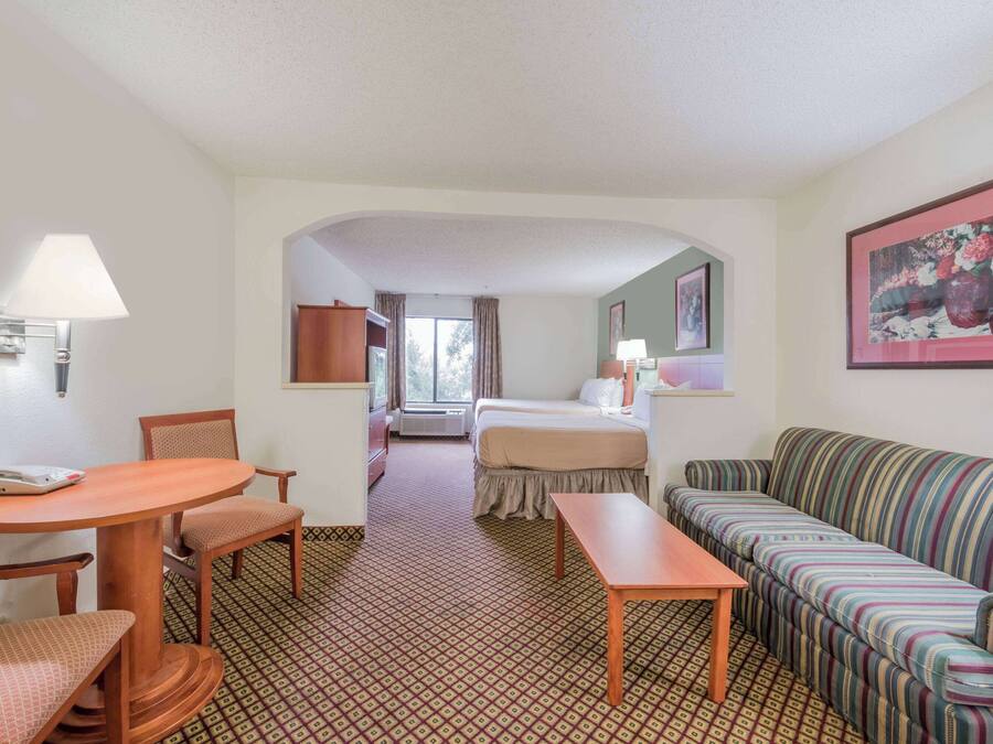 Desk, iron/ironing board, free cribs/infant beds, rollaway beds