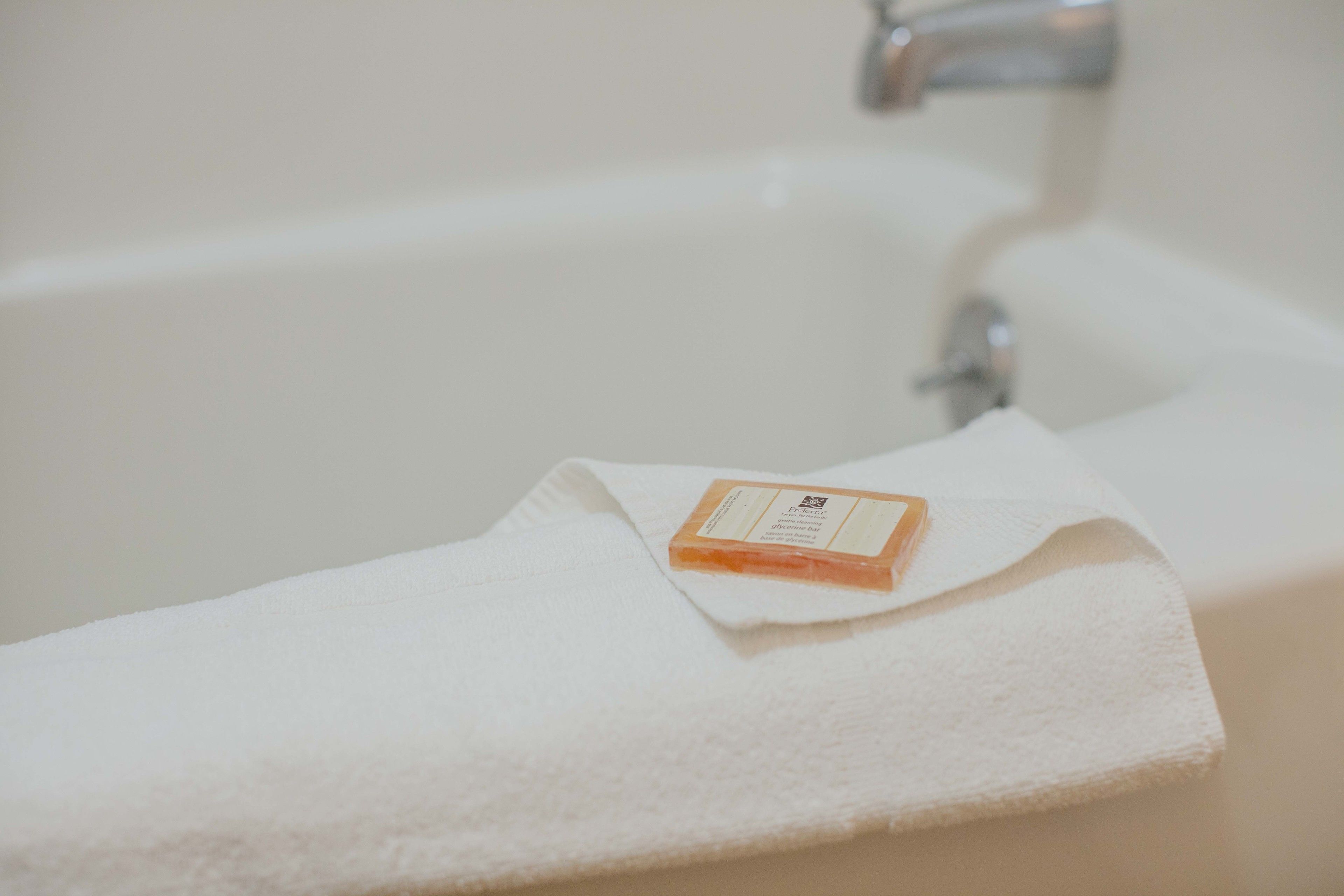 cottage, 2 queen beds, garden area | bathroom amenities | combined shower/bathtub, free toiletries, hair dryer, towels