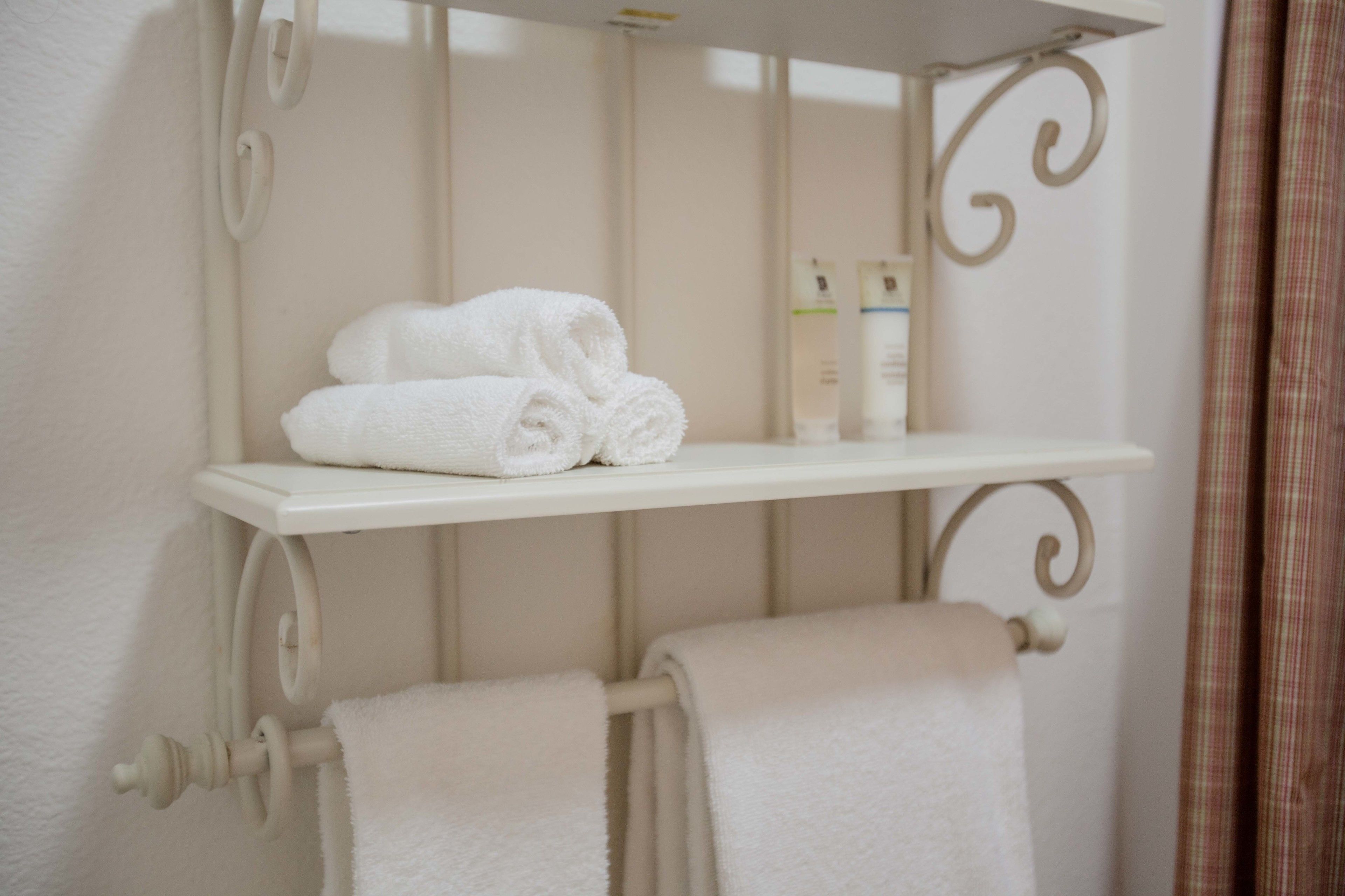 cottage, 2 queen beds, garden area | bathroom amenities | combined shower/bathtub, free toiletries, hair dryer, towels