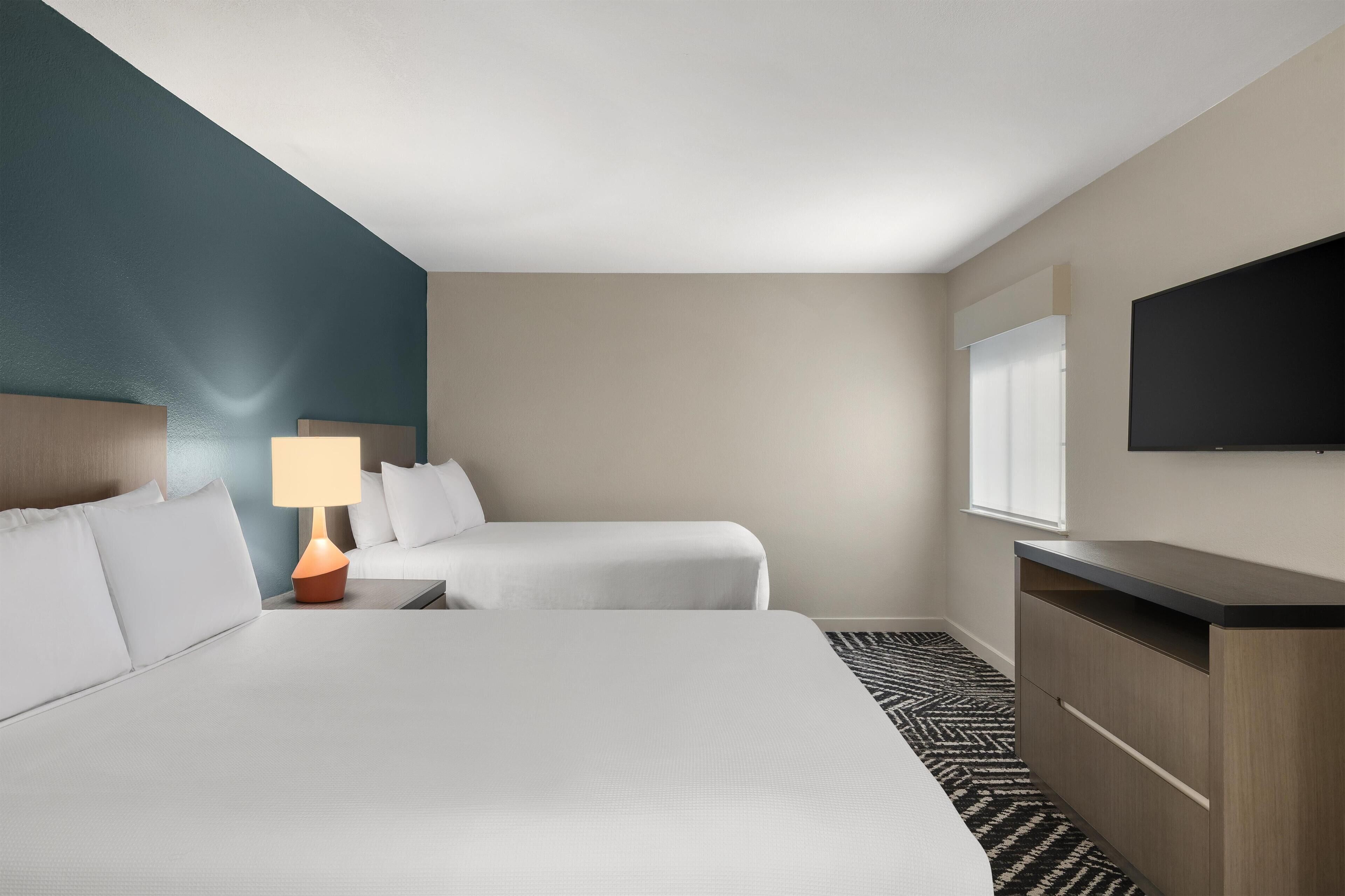 Suite, 1 Bedroom (2 Double Beds) | Hypo-allergenic bedding, in-room safe, desk, blackout drapes