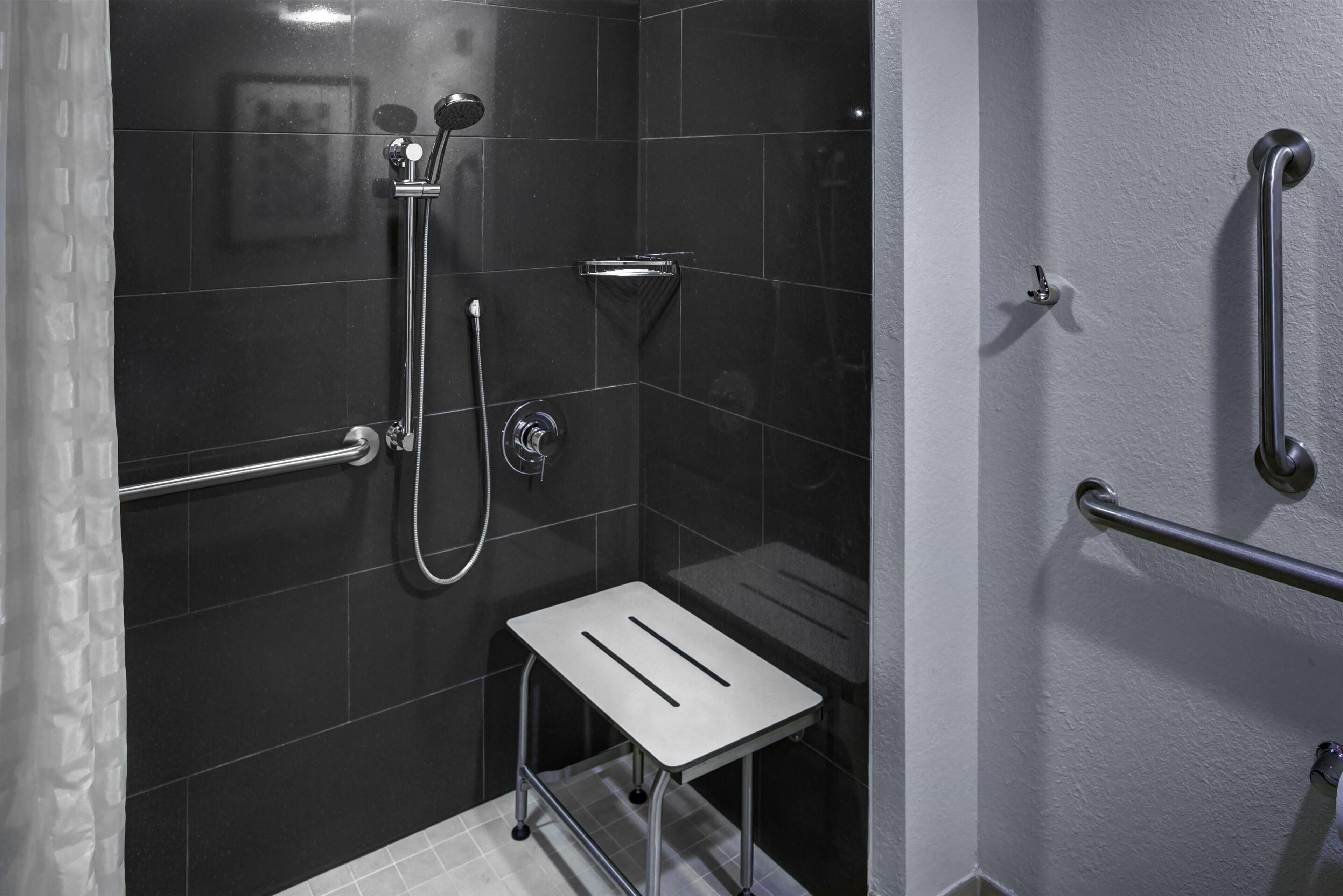 suite, 1 bedroom, accessible, bathtub | bathroom | designer toiletries, hair dryer, towels, soap