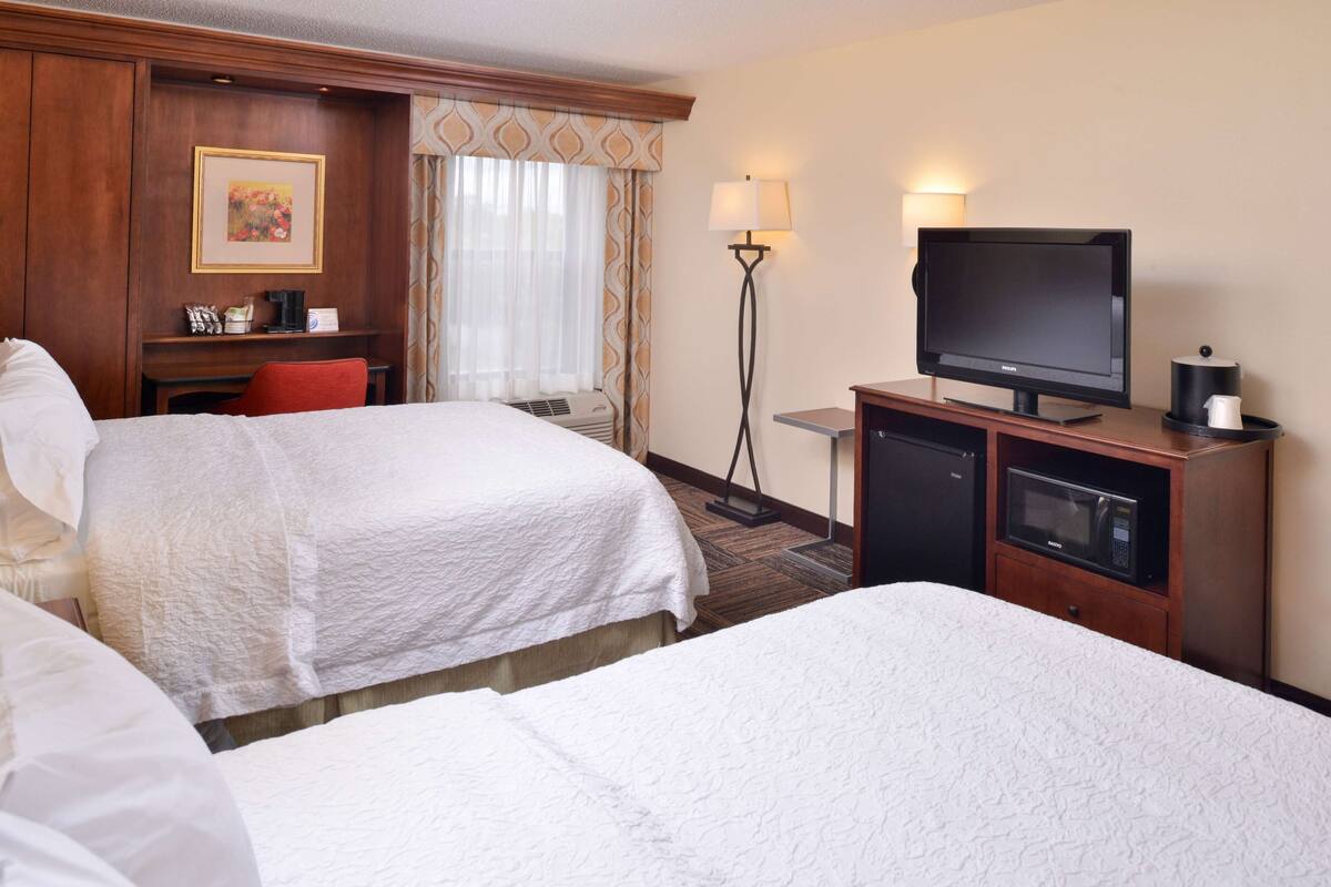Down comforters, desk, laptop workspace, blackout drapes