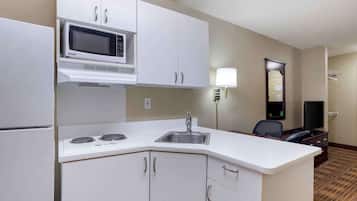 Fridge, microwave, stovetop, cookware/dishes/utensils