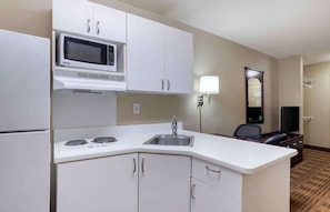 Fridge, microwave, stovetop, cookware/dishes/utensils