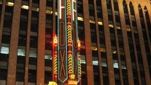A theater with a prominent neon sign reading "FOX" and "Detroit's West Entertainment". - A Victory Inn & Suites - Detroit (Detroit)