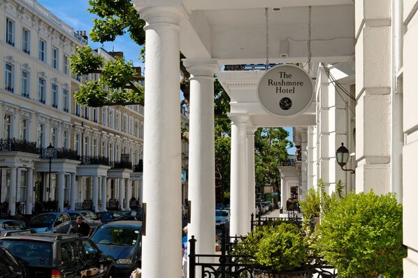 A hotel entrance with a sign reading "The Rushmore Hotel." - Rushmore Hotel (London)