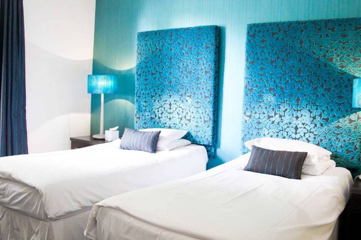 Twin Room | Iron/ironing board, WiFi (free), alarm clocks