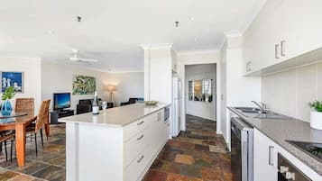 Superior Apartment, 3 Bedrooms | Private kitchen | Coffee/tea maker, fridge, microwave, oven