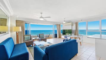 Deluxe Apartment, 2 Bedrooms | Living area | 50-inch Smart TV with digital channels, TV