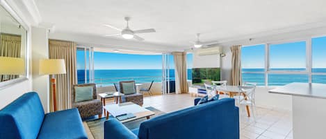 Deluxe Apartment, 2 Bedrooms | Living area | 50-inch Smart TV with digital channels, TV