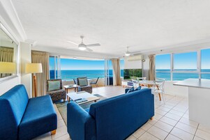 Deluxe Apartment, 2 Bedrooms | Living area | 50-inch Smart TV with digital channels, TV