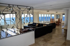 3 Bedroom Sub-Penthouse Ocean View, Ocean Front | Living area | 50-inch Smart TV with digital channels, TV - Zenith Ocean Front Apartments (Surfers Paradise)