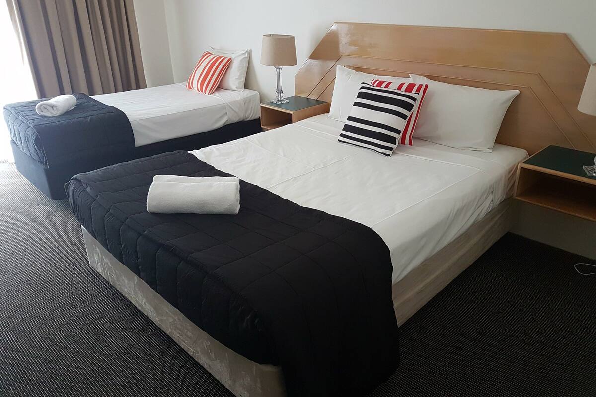 Triple Room | Desk, laptop workspace, blackout curtains, iron/ironing board