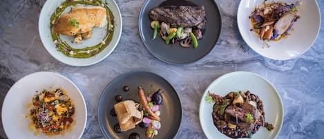 Breakfast, lunch, dinner served; Eastern European cuisine, pool views