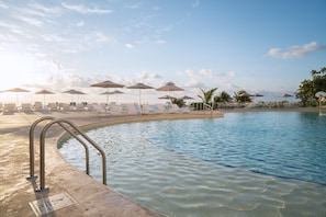 Outdoor pool, pool umbrellas, sun loungers