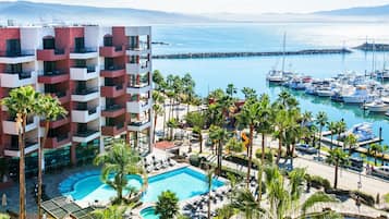 Indoor pool, 2 outdoor pools, open 10:00 AM to 9:00 PM, pool umbrellas