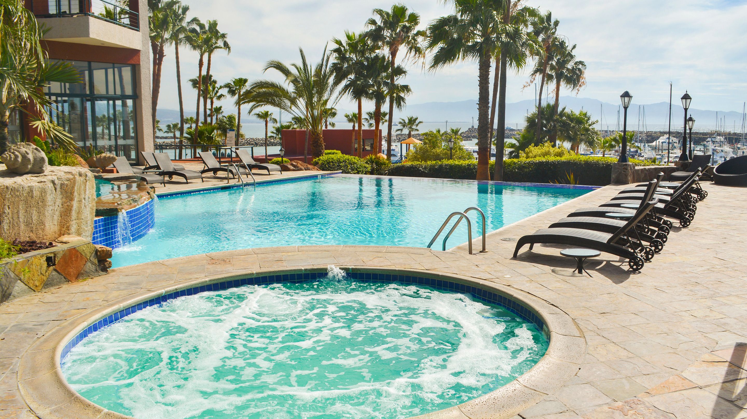 Indoor pool, 2 outdoor pools, open 10:00 AM to 9:00 PM, pool umbrellas