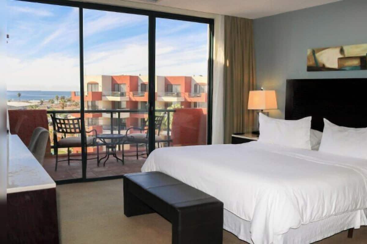 Junior Room, 1 Queen Bed, Balcony, Sea View | 1 bedroom, desk, laptop workspace, blackout drapes