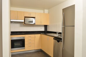 Penthouse (Apartment) | Private kitchen | Fridge, coffee/tea maker