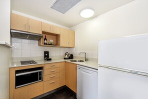 Fridge, coffee/tea maker, cookware/dishes/utensils